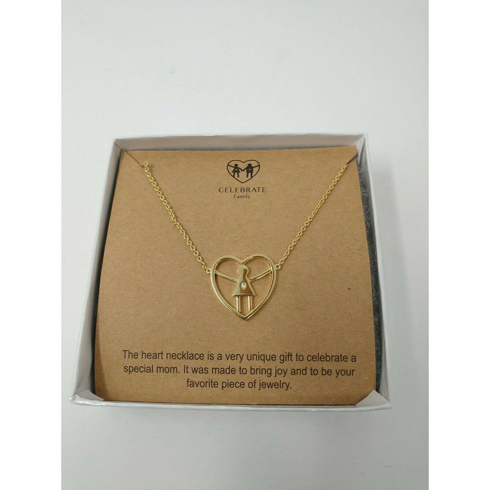 Gold tone heart necklace with family centerpiece